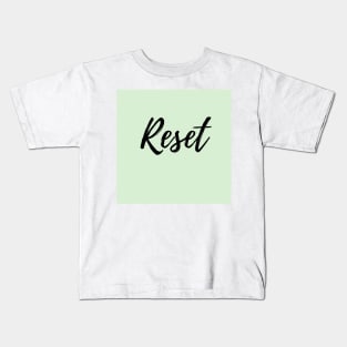 Reset - positive affirmation word, green background Kids T-Shirt